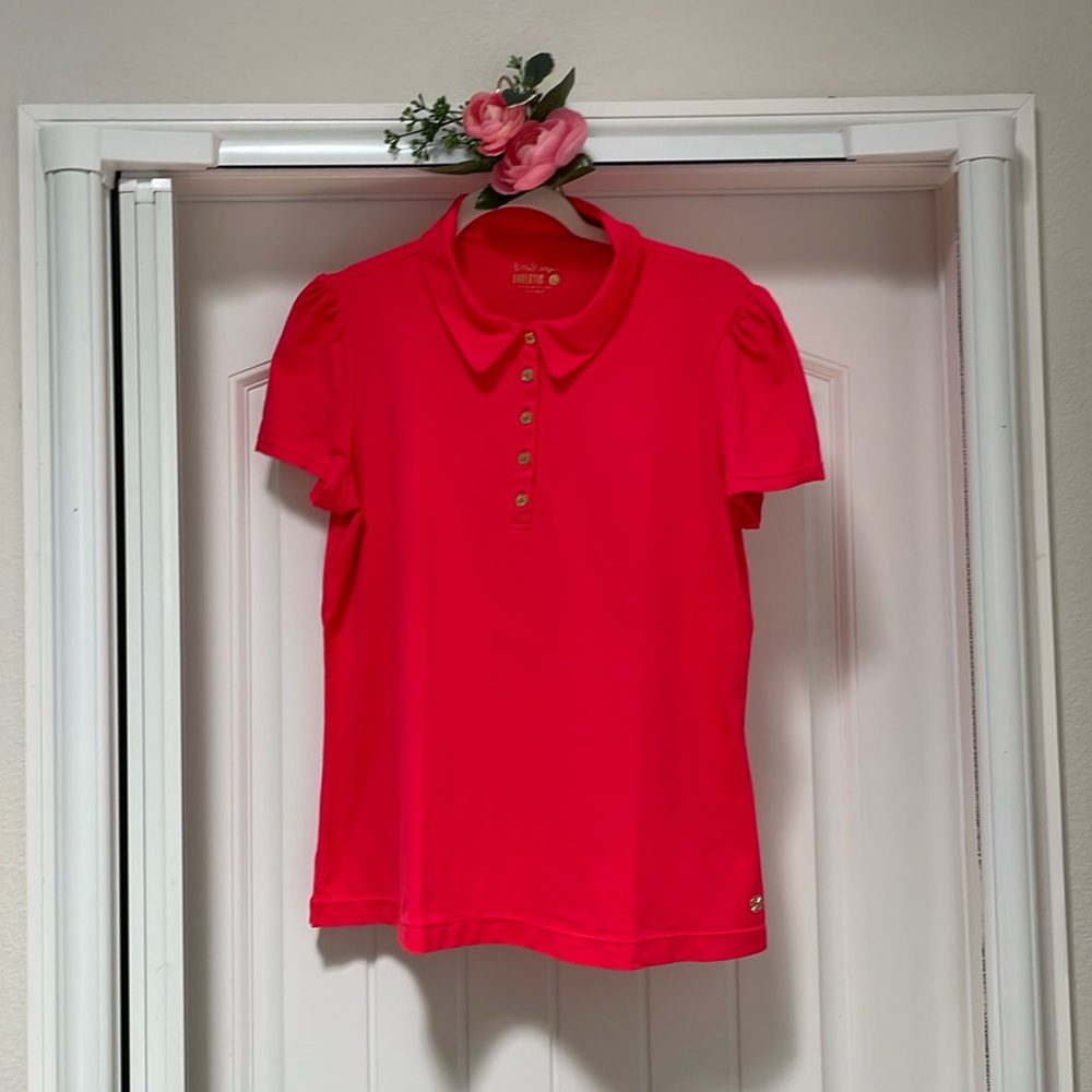 Lilly Pulitzer Luxletic Puff Sleeve Polo in color Ruby Red, size Large.